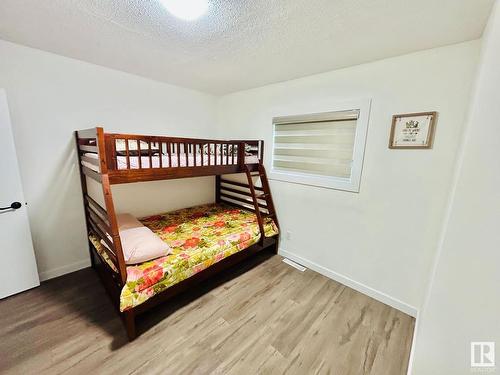 3602 50Th Avenue, Sylvan Lake, AB - Indoor Photo Showing Bedroom