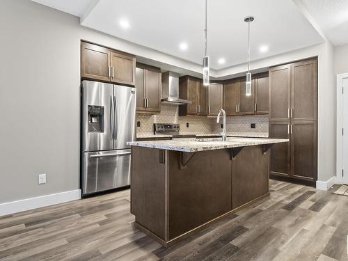 223 524 Griesbach Parade, Edmonton, AB - Indoor Photo Showing Kitchen With Stainless Steel Kitchen With Upgraded Kitchen