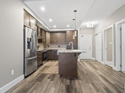 223 524 Griesbach Parade, Edmonton, AB - Indoor Photo Showing Kitchen With Stainless Steel Kitchen With Upgraded Kitchen