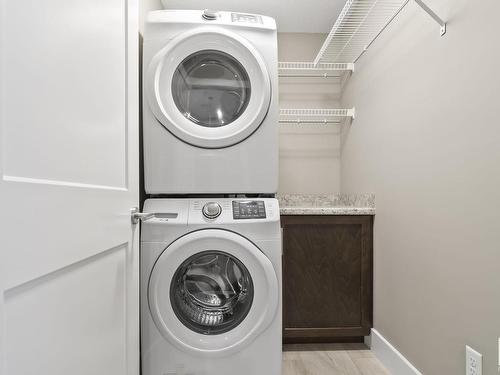 223 524 Griesbach Parade, Edmonton, AB - Indoor Photo Showing Laundry Room