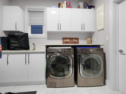 1353 Enright Landing Landing, Edmonton, AB - Indoor Photo Showing Laundry Room