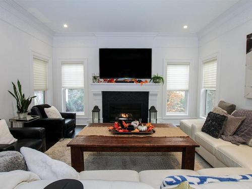 438 Estate Drive, Sherwood Park, AB - Indoor Photo Showing Living Room With Fireplace