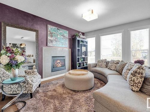 7731 Getty Wynd, Edmonton, AB - Indoor Photo Showing Living Room With Fireplace