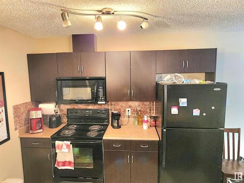 138 1180 Hyndman Road, Edmonton, AB - Indoor Photo Showing Kitchen