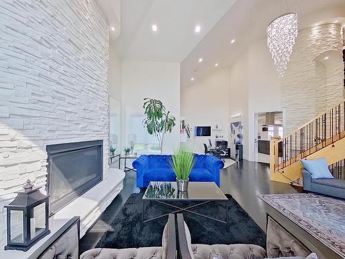 16611 9 St, Edmonton, AB - Indoor Photo Showing Living Room With Fireplace