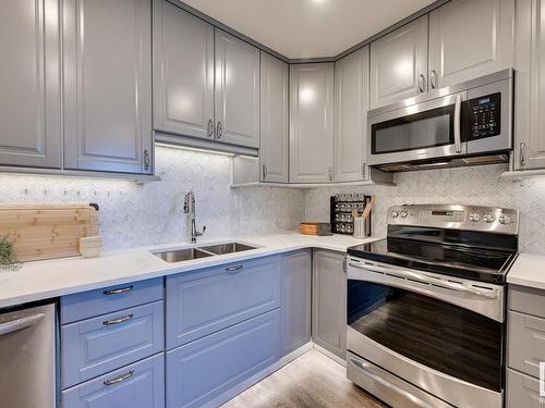 1206 10145 109 Street, Edmonton, AB - Indoor Photo Showing Kitchen With Stainless Steel Kitchen With Double Sink With Upgraded Kitchen