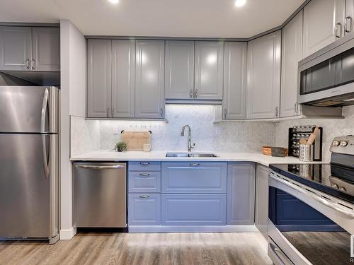 1206 10145 109 Street, Edmonton, AB - Indoor Photo Showing Kitchen With Stainless Steel Kitchen With Double Sink With Upgraded Kitchen