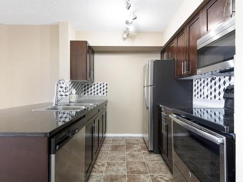 309 3207 James Mowatt Trail, Edmonton, AB - Indoor Photo Showing Kitchen With Stainless Steel Kitchen