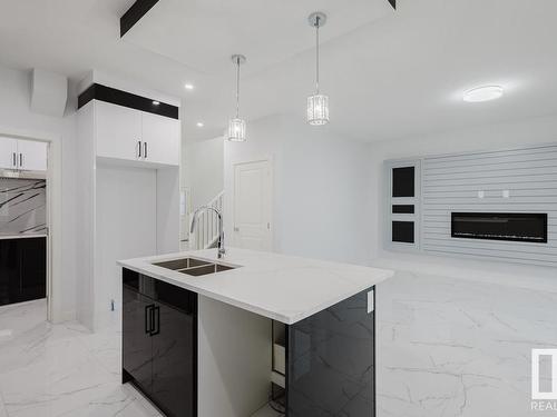 1339 14 Avenue, Edmonton, AB - Indoor Photo Showing Kitchen With Double Sink