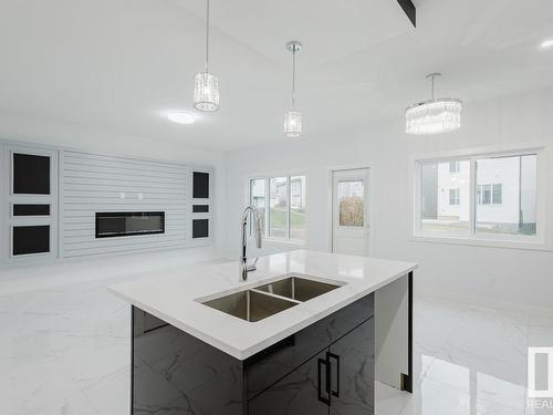 1339 14 Avenue, Edmonton, AB - Indoor Photo Showing Kitchen With Double Sink