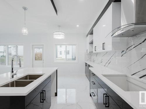 1339 14 Avenue, Edmonton, AB - Indoor Photo Showing Kitchen With Double Sink