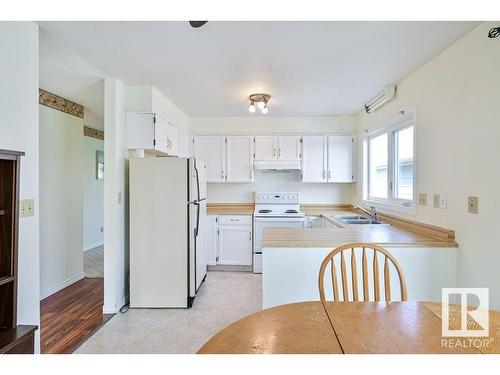 4507 51 Street, Millet, AB - Indoor Photo Showing Kitchen With Double Sink