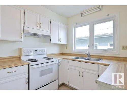 4507 51 Street, Millet, AB - Indoor Photo Showing Kitchen With Double Sink