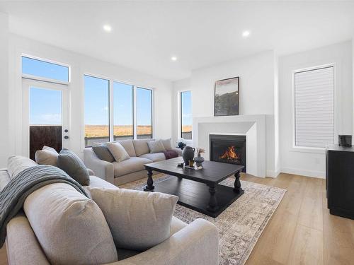 39 Darby Crescent, Spruce Grove, AB - Indoor Photo Showing Living Room With Fireplace