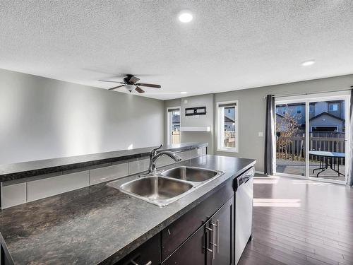 5325 15 Avenue, Edmonton, AB - Indoor Photo Showing Kitchen With Double Sink