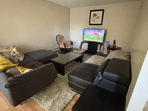 7723 75 Street, Edmonton, AB - Indoor Photo Showing Living Room