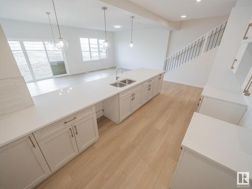 65 Baker Street, Ardrossan, AB - Indoor Photo Showing Kitchen With Double Sink