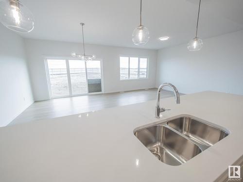 65 Baker Street, Ardrossan, AB - Indoor Photo Showing Kitchen With Double Sink