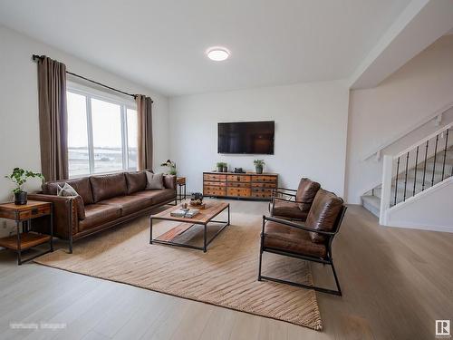 65 Baker Street, Ardrossan, AB - Indoor Photo Showing Living Room