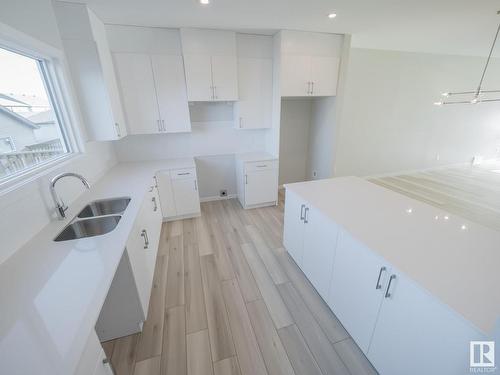 7178 177A Avenue, Edmonton, AB - Indoor Photo Showing Kitchen With Double Sink