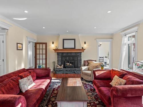 13415 103 Avenue, Edmonton, AB - Indoor Photo Showing Living Room With Fireplace