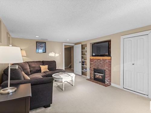 13415 103 Avenue, Edmonton, AB - Indoor Photo Showing Living Room With Fireplace