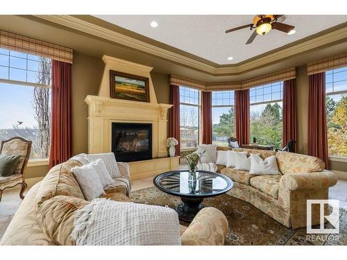 37 Riverridge Road, Rural Sturgeon County, AB - Indoor Photo Showing Living Room With Fireplace