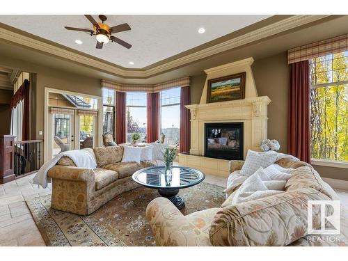 37 Riverridge Road, Rural Sturgeon County, AB - Indoor Photo Showing Living Room With Fireplace