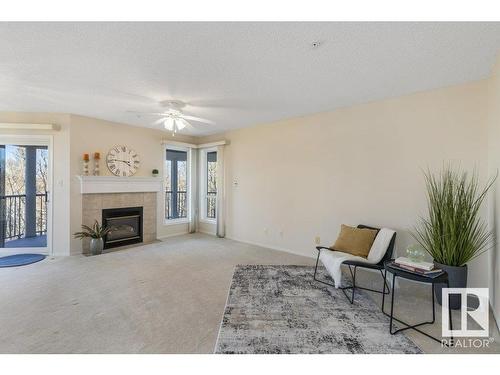 403 75 Gervais Road, St. Albert, AB - Indoor Photo Showing Living Room With Fireplace