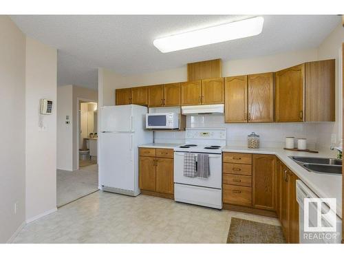 403 75 Gervais Road, St. Albert, AB - Indoor Photo Showing Kitchen With Double Sink