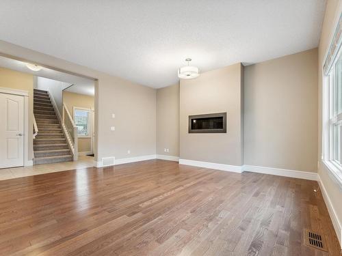 3915 Agar Court, Edmonton, AB - Indoor Photo Showing Living Room With Fireplace