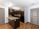 104 103 Ambleside Drive, Edmonton, AB  - Indoor Photo Showing Kitchen With Double Sink 