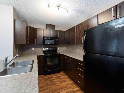 104 103 Ambleside Drive, Edmonton, AB - Indoor Photo Showing Kitchen With Double Sink