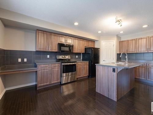 103 655 Tamarack Road, Edmonton, AB - Indoor Photo Showing Kitchen With Double Sink