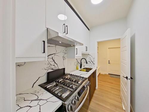 5806 Peltier Close, Beaumont, AB - Indoor Photo Showing Kitchen With Double Sink