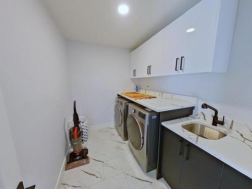 5806 Peltier Close, Beaumont, AB - Indoor Photo Showing Laundry Room