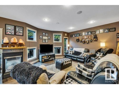 8-50322 Rge Rd 10, Rural Parkland County, AB - Indoor Photo Showing Living Room With Fireplace