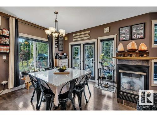 8-50322 Rge Rd 10, Rural Parkland County, AB - Indoor Photo Showing Dining Room With Fireplace