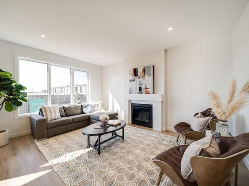 29 Cannes Cove, St. Albert, AB - Indoor Photo Showing Living Room With Fireplace