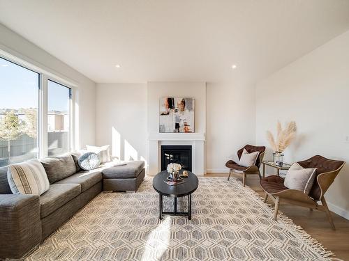 29 Cannes Cove, St. Albert, AB - Indoor Photo Showing Living Room With Fireplace