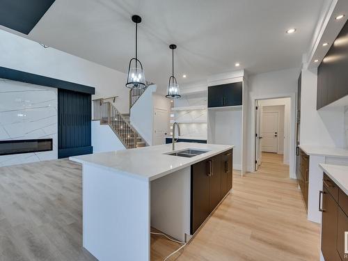 9 Elderberry Point(E), Fort Saskatchewan, AB - Indoor Photo Showing Kitchen With Double Sink With Upgraded Kitchen