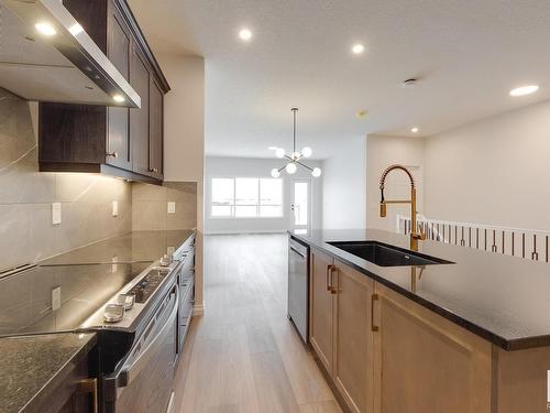 177 Stonehouse Way, Leduc, AB - Indoor Photo Showing Kitchen With Upgraded Kitchen