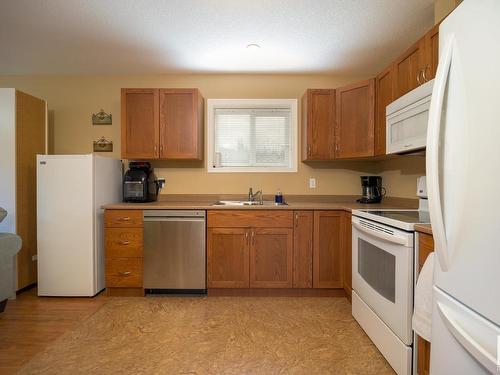 4910 58 Street, Athabasca Town, AB - Indoor Photo Showing Kitchen With Double Sink