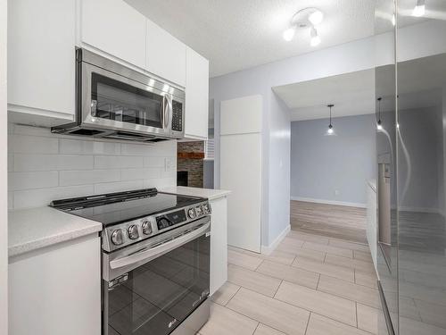 111 12416 161 Avenue, Edmonton, AB - Indoor Photo Showing Kitchen