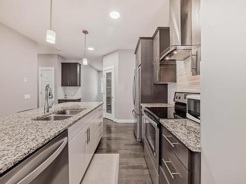 16809 65 Street, Edmonton, AB - Indoor Photo Showing Kitchen With Stainless Steel Kitchen With Double Sink With Upgraded Kitchen