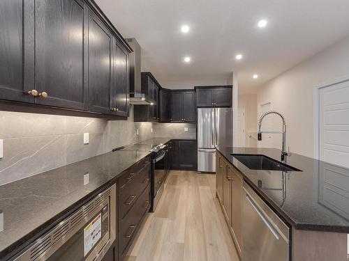 175 Stonehouse Way, Leduc, AB - Indoor Photo Showing Kitchen With Stainless Steel Kitchen With Upgraded Kitchen