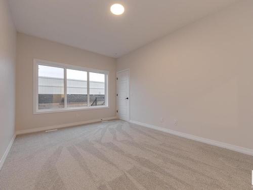 175 Stonehouse Way, Leduc, AB - Indoor Photo Showing Other Room