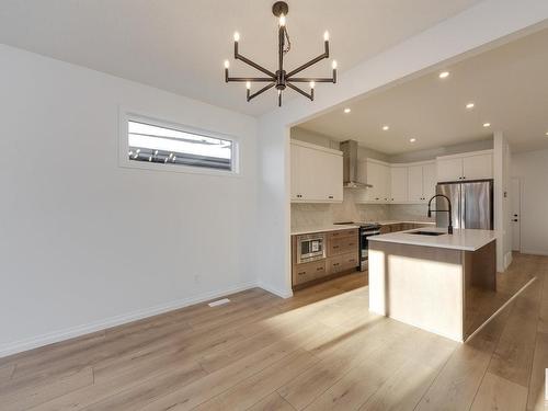 179 Stonehouse Way, Leduc, AB - Indoor Photo Showing Kitchen