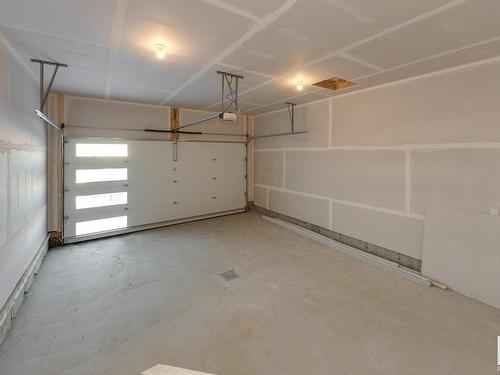 179 Stonehouse Way, Leduc, AB - Indoor Photo Showing Garage