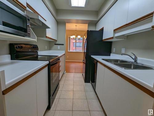 305 10130 114 Street, Edmonton, AB - Indoor Photo Showing Kitchen With Double Sink